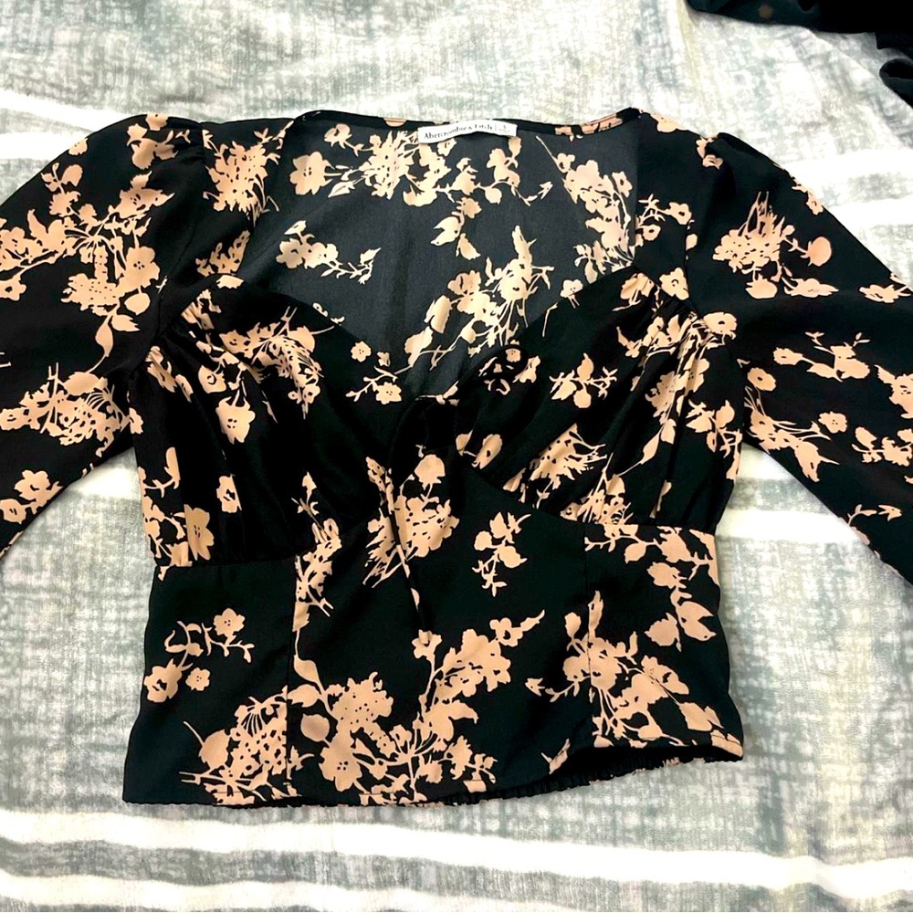 Black and pink floral long-sleeve top 
Low-cut